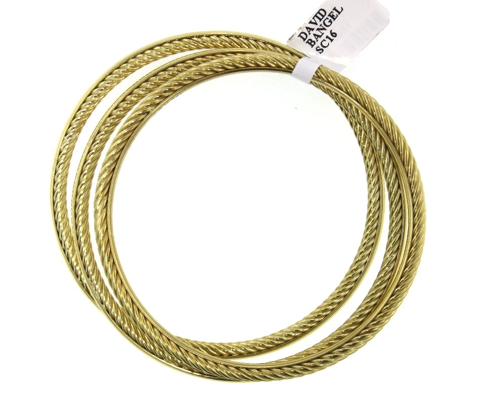 3 David Yurman 18KT Solid Gold Bangles GB16: "3 David Yurman 18KT Solid Gold Bangles GB16. Great Condition! PF1002HG. Three 18KT yellow gold David Yurman bangles. The total weight of these bangles is 33.4gms. Guarenteed authentic! Good Condition