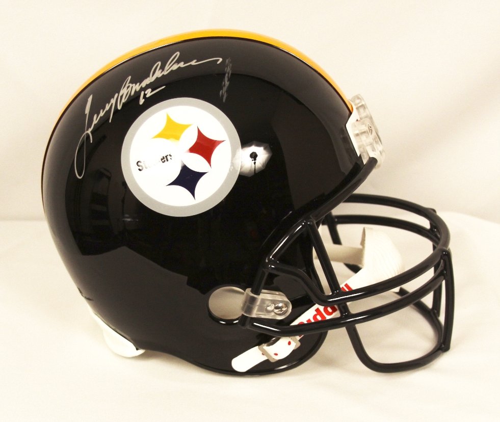 Terry Bradshaw Autographed Helmet SM54: "Terry Bradshaw Autographed Helmet SM54. As-Is Condition! SN153KD. This Pittsburg Steelers helmet is signed by Terry Bradshaw. There is a slight scuff on the helmet. Comes with a certificate of authen