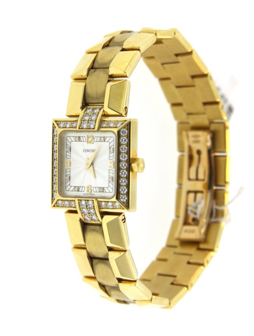 Ladies 18KT Yellow Gold Concord La Scala Square with Di: "Ladies 18KT Yellow Gold Concord La Scala Square with Diamonds Watch GB12. Great Condition! SD1024RE. One ladies 18KT Yellow Gold Concord La Scala Square with Diamonds Watch. This beautiful watch feat