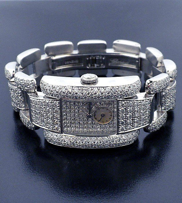 Ladies 18KT White Gold Chopard La Strada 15.00ct Diamon: "Ladies 18KT White Gold Chopard La Strada 15.00ct Diamond Watch GB19. Good Condition! ZT1078LH. One ladies, Chopard La Strada diamond wristwatch electronically tested 18KT white gold, Case: 35x24mm, t