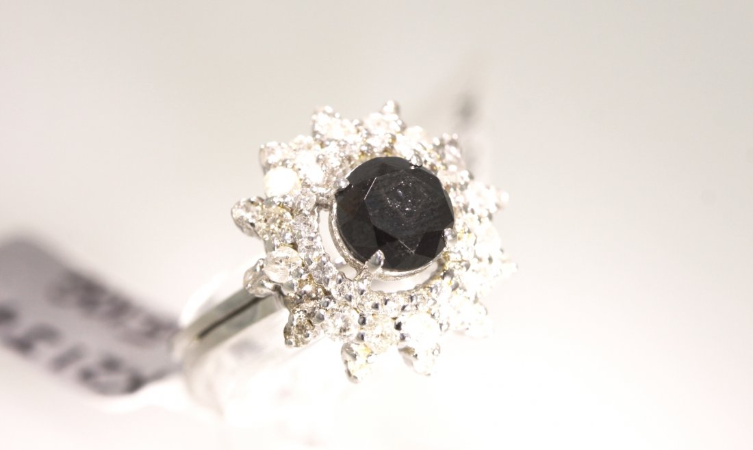 14KT White Gold 2.85ctw Black and White Diamond Ring RM: "14KT White Gold 2.85ctw Black and White Diamond Ring RM441. Excellent Condition! WL647PS. One ladies polished, stamped and electronically tested solid 14k white gold ring mounted with: (1) Genuine 1.