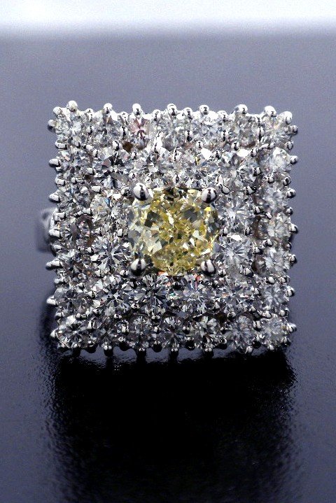 18KT White Gold 3.06ct Yellow and White Diamond Ring A3: 18KT White Gold 3.06ct Yellow and White Diamond Ring A3547. New Condition! DM1292TG. One electronically tested 18KT white gold ladies cast diamond ring. Good workmanship. The featured diamond is set w