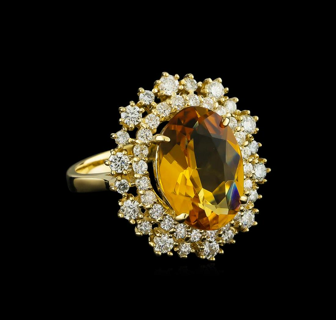 4.23 ctw Citrine and Diamond Ring - 14KT Yellow Gold: One electronically tested 14KT yellow gold lady's cast fashion ring with a double basket halo with a bright polish finish. The featured lady's ring has a shank measuring 2.79 millimeters wide. Identif