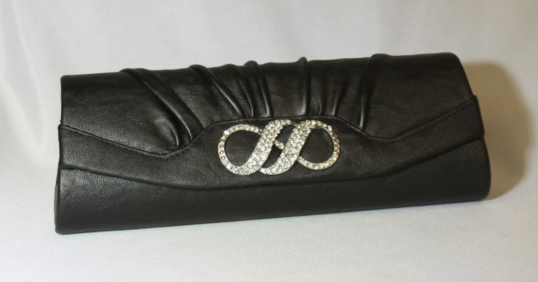 Black studded Purse RTB48: "Black studded Purse RTB48. Great Condition! PF7HA. One black studded evening purse measuring 4" tall X 11" length X 2.5" width. Decorated with patterned rhinestones this purse comes with one 48" chai