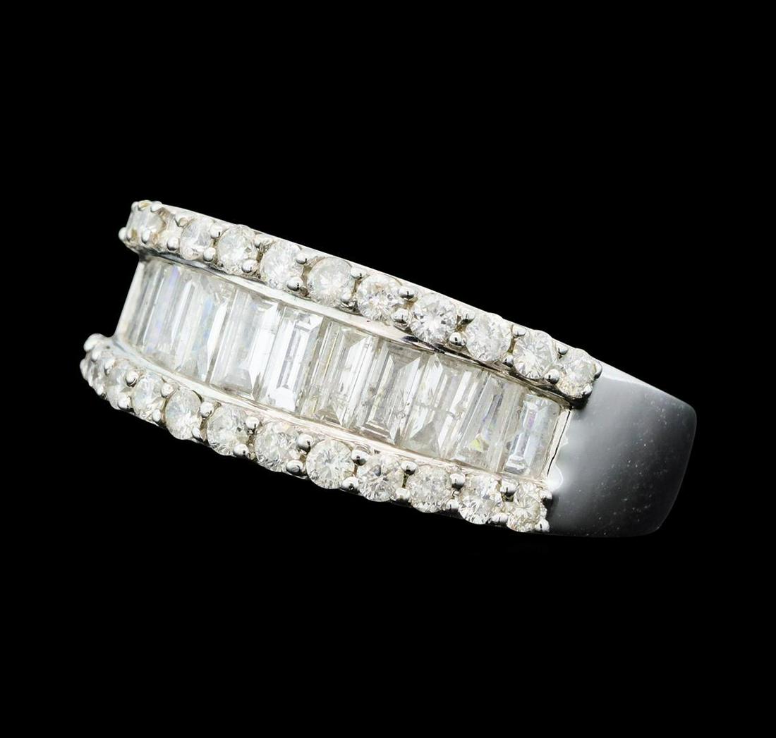 1.95 ctw Diamond Band - 14KT White Gold: One electronically tested 14KT white gold lady's cast wedding band with a tapered shank with a bright polish finish. The featured lady's ring has a shank measuring 3.65 millimeters wide. Identified wi