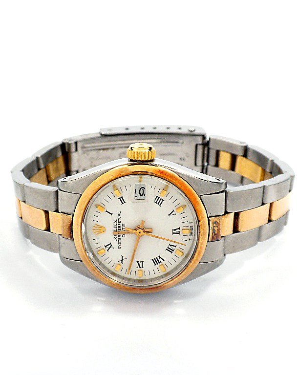 Ladies Rolex Two-Tone Date Watch A3828: Ladies Rolex Two-Tone Date Watch A3828. Excellent Condition! WC1561PK. One ladies, hand crafted & machine milled Rolex Date Model stainless steel & 14KT yellow gold wristwatch electronically tested, C