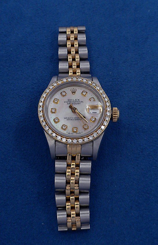 Ladies Rolex Two Tone DateJust Watch GB42: Ladies Rolex Two Tone DateJust Watch GB42. Excellent Condition! LC1582CK. One ladies hand crafted & machine milled Rolex DateJust Model stainless steel & 18KT yellow gol wristwatch electronically test