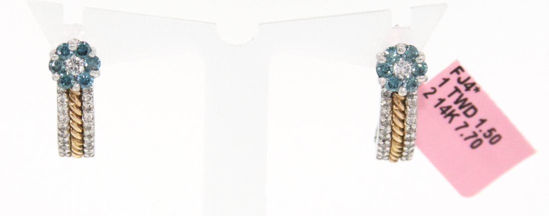 14KT White Gold 1.5ct Blue and White Diamond Earrings F: 14KT White Gold 1.5ct Blue and White Diamond Earrings FJM1044. Excellent Condition! BG216AL. One pair of 14KT white gold blue and white diamond earrings. The pair features blue and white diamonds weig