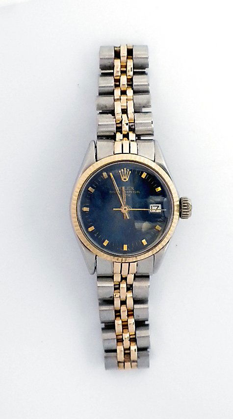 Lady Rolex Two-Tone Date Model Wristwatch A3704: Lady Rolex Two-Tone Date Model Wristwatch A3704. Good Condition! WE1571EW. One ladies, hand crafted & machine milled Rolex Date Model stainless steel & 14KT yellow gold wristwatch electronically teste