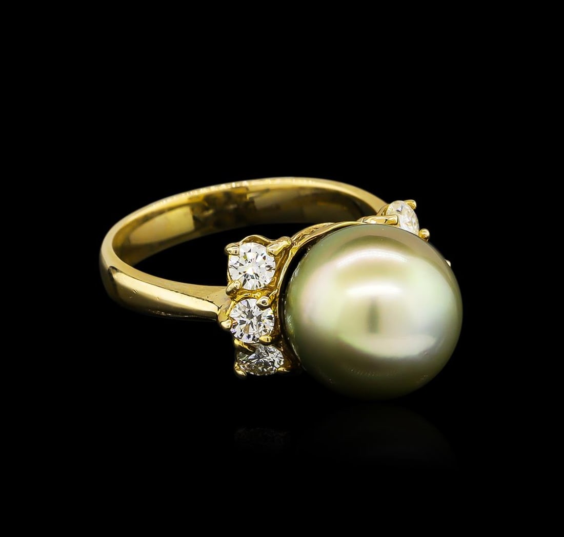 0.66 ctw Pearl and Diamond Ring - 14KT Yellow Gold: One ring featuring: 14KT yellow gold weighing 4.22 grams containing one pearl and side diamonds with a total weight of 0.66ct.