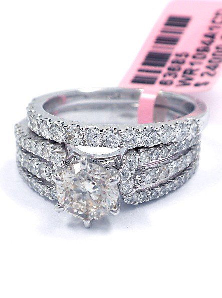14KT White Gold 1.93tcw Diamond Wedding Ring Set FJM167: 14KT White Gold 1.93tcw Diamond Wedding Ring Set FJM1672. Excellent Condition! QN1042FT. One electronically tested 14KT white gold ladies diamond wedding set with a bright polish finish. Condition is