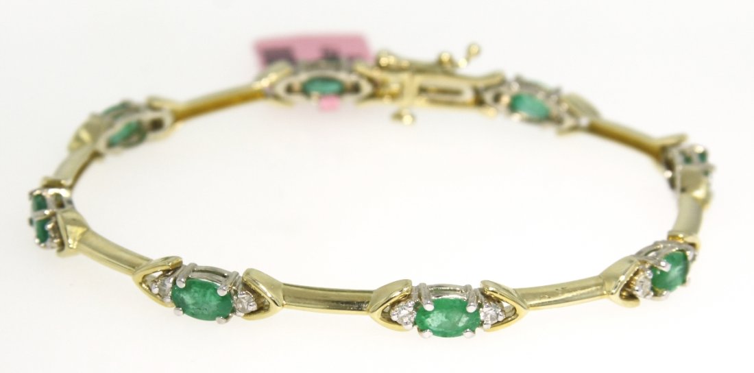 14KT Yellow Gold 3.12ct Emerald and Diamond Bracelet FJ: 14KT Yellow Gold 3.12ct Emerald and Diamond Bracelet FJM1102. Excellent Condition! LW148TS. One 14KT yellow gold emerald and diamond bracelet. Features 8 emeralds weighing a total of 3.12cts and round