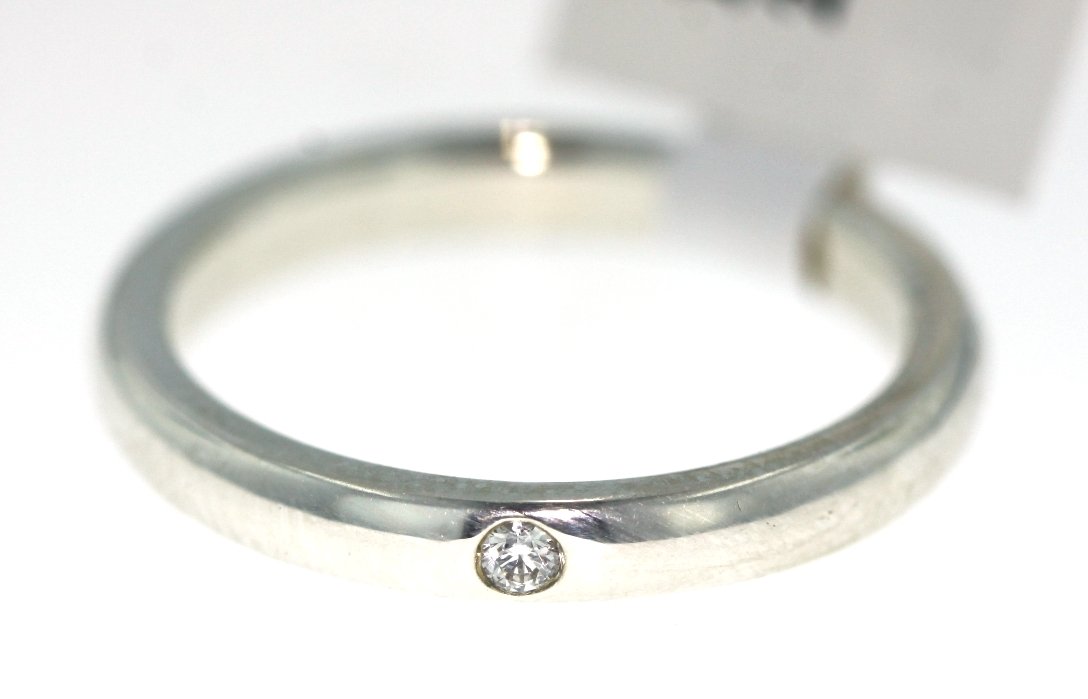 Tiffany & Co Sterling Silver Peretti Diamond Ring GB51: Tiffany & Co Sterling Silver Peretti Diamond Ring GB51. Great Condition! VZ11LM. One Tiffany & Co sterling silver Peretti diamond ring. Ring size is approximately 5.25. Total weight of ring is 2.69gm.