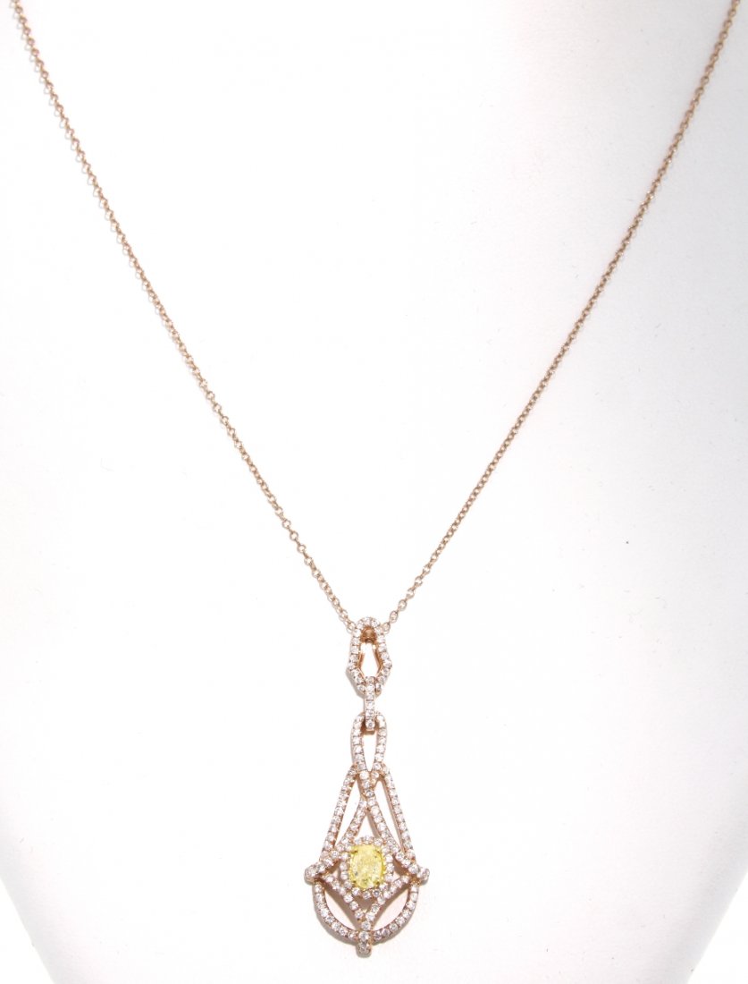 18KT Rose Gold Yellow and White Diamond Pendant and Cha: 18KT Rose Gold Yellow and White Diamond Pendant and Chain FJM1110. Excellent Condition! NT9611HV. One 18KT rose gold yellow and white diamond pendant with chain. Features one fancy yellow diamond weig