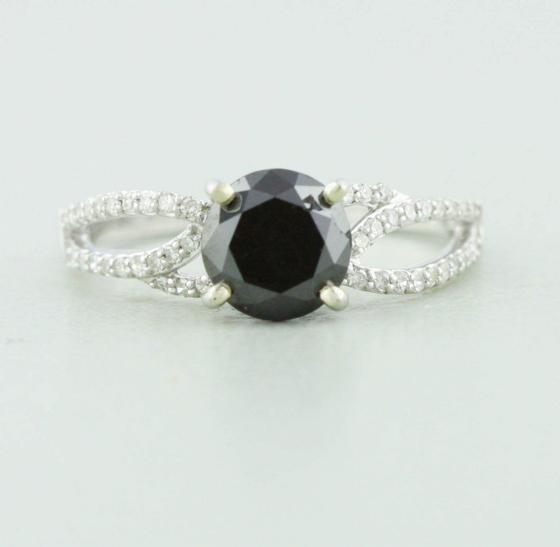 18KT White Gold 1.83tcw Black and White Diamond Ring RM: 18KT White Gold 1.83tcw Black and White Diamond Ring RM634. Excellent Condition! UJ424GK. One lady's polished, stamped and electronically tested solid 18k white gold ring mounted with: 1 Genuine Round