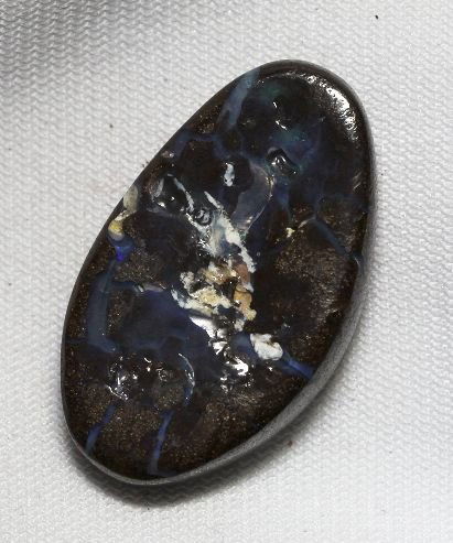 Boulder Opal (28.39ct.) BO125: Boulder Opal (28.39ct.) BO125. Excellent Condition! SG4CJ. One Boulder Opal weighing 28.39ctw. Thank you for viewing this lot. We are always adding new inventory and new auctions, so check back often.