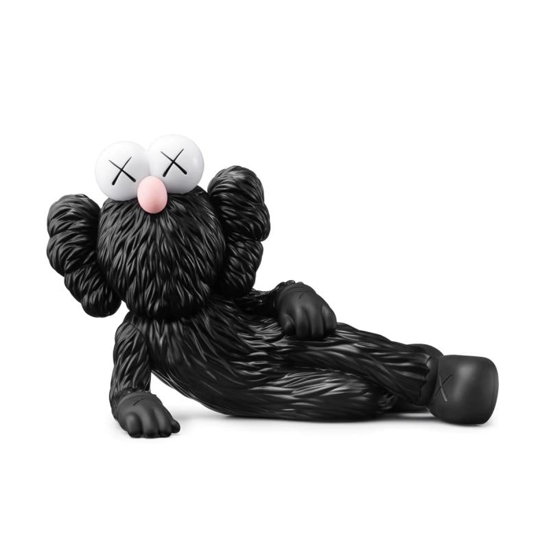 Time Off by KAWS: Time Off (Black)" is a vinyl sculpture by KAWS featuring his famous BFF character. The figure is new in box. Measures approx. 7" x 11" x 5.5