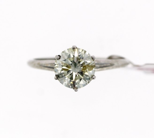 10KT White Gold 1.40tcw Diamond Solitaire Ring A3948: 10KT White Gold 1.40tcw Diamond Solitaire Ring A3948. Excellent Condition! SH9302PM. One ladies' diamond solitaire ring, stamped and tested 10KT white gold, containing 1 full cut round brilliant diamo