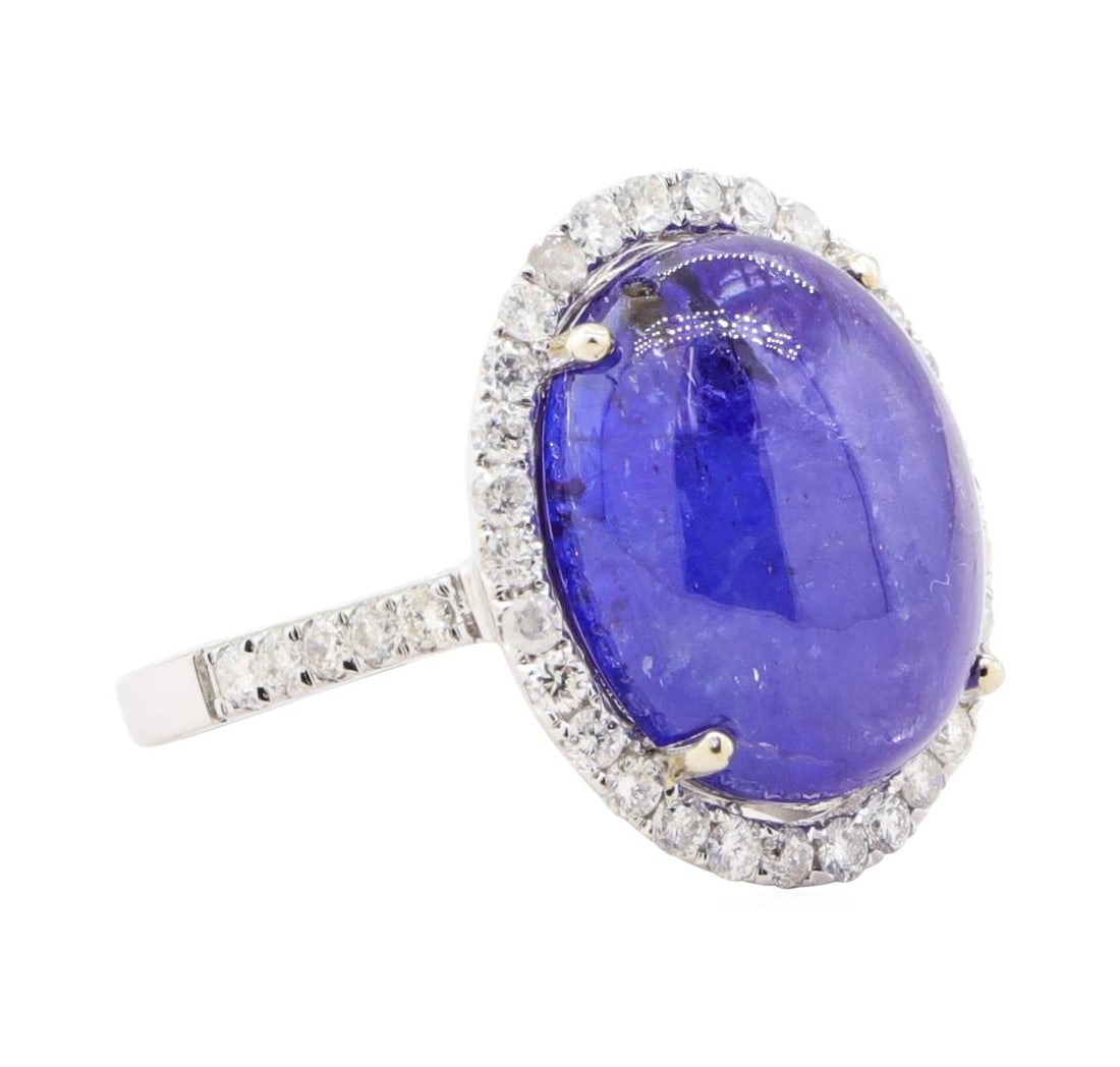13.60 ctw Tanzanite And Diamond Ring - 14KT White Gold: One electronically tested 14KT white gold lady's cast fashion halo ring with a cathedral shank with a bright polish finish. Trademark is Orianne. Identified with markings of '14K'. Condition is new, g