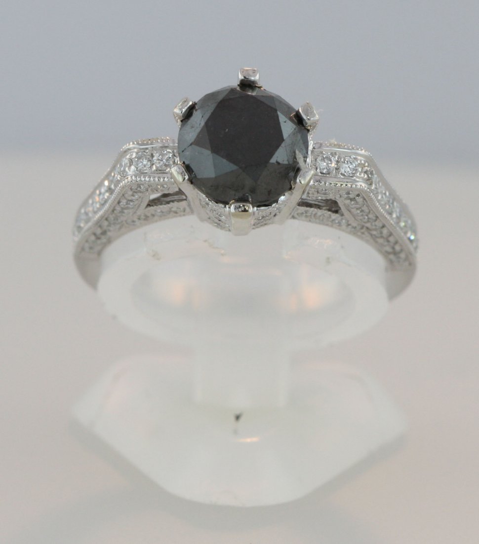 14KT White Gold 2.91ct Black & White Diamond Ring RM593: 14KT White Gold 2.91ct Black & White Diamond Ring RM593. Excellent Condition! SG156SZ. One lady's polished, stamped and electronically tested solid 14k white gold ring mounted with: 1 Genuine Round Bl