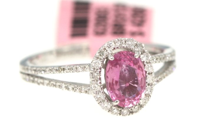 14KT White Gold .97ct Pink Sapphire and Diamond Ring FJ: 14KT White Gold .97ct Pink Sapphire and Diamond Ring FJM964. Excellent Condition! ZJ124AQ. One 14KT white gold Michael Christoff pink sapphire and diamond ring. Features one pink sapphire weighing 0.9
