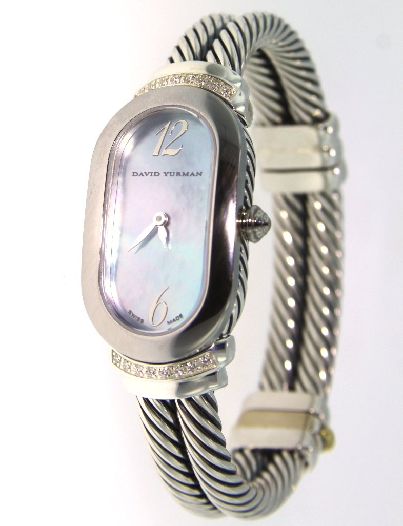 David Yurman Sterling Silver/Stainless Steel Petite Mad: David Yurman Sterling Silver/Stainless Steel Petite Madison Watch ED1328. Excellent Condition! JS1711JN. One David Yurman Petite Madison Wristwatch. Style: Petite Madison. Case: Stainless steel and st