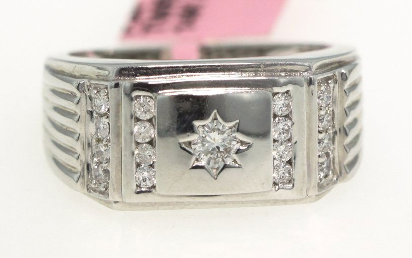 14KT White Gold .5ct Diamond Ring FJM1198: 14KT White Gold .5ct Diamond Ring FJM1198. Excellent Condition! YX145BN. One 14KT white gold diamond ring. Features round diamonds weighing a total of 0.50cts .Total weight of ring is 8.55gms. Approxi