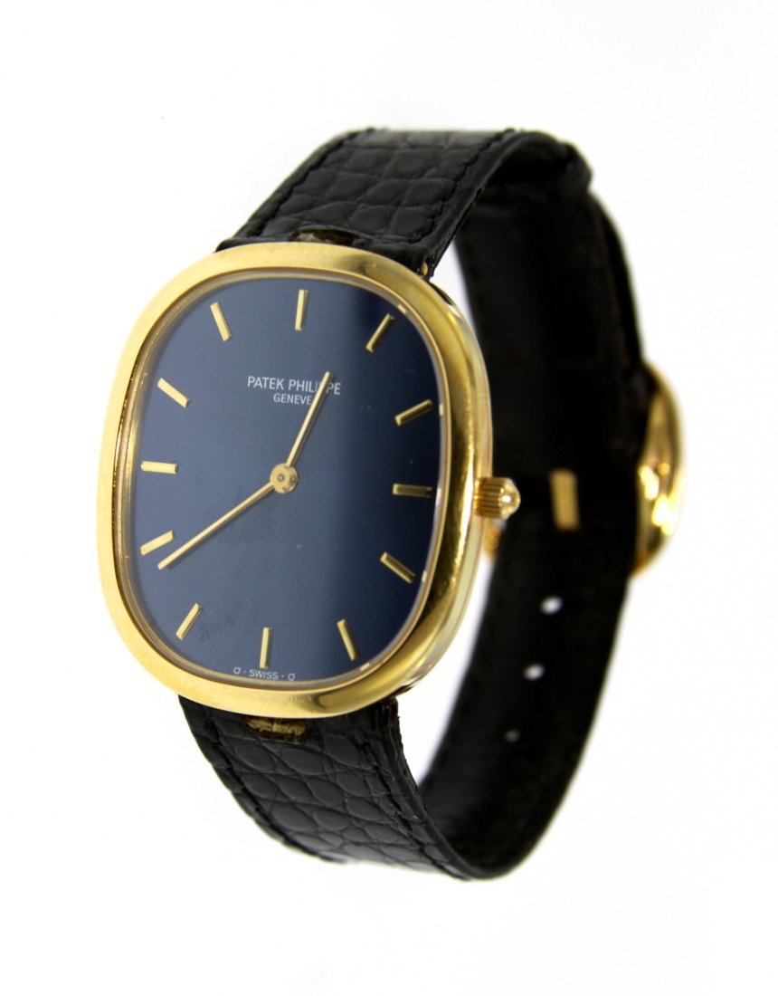 Mens 18KT Yellow Gold Patek Philippe Golden Ellipse 373: Mens 18KT Yellow Gold Patek Philippe Golden Ellipse 3738 Watch GB37. Great Condition! PB1099JS. One Mens 18KT Yellow Gold Patek Philippe Ellipse 3738 Watch. Features: 18k yellow gold case. Black croco