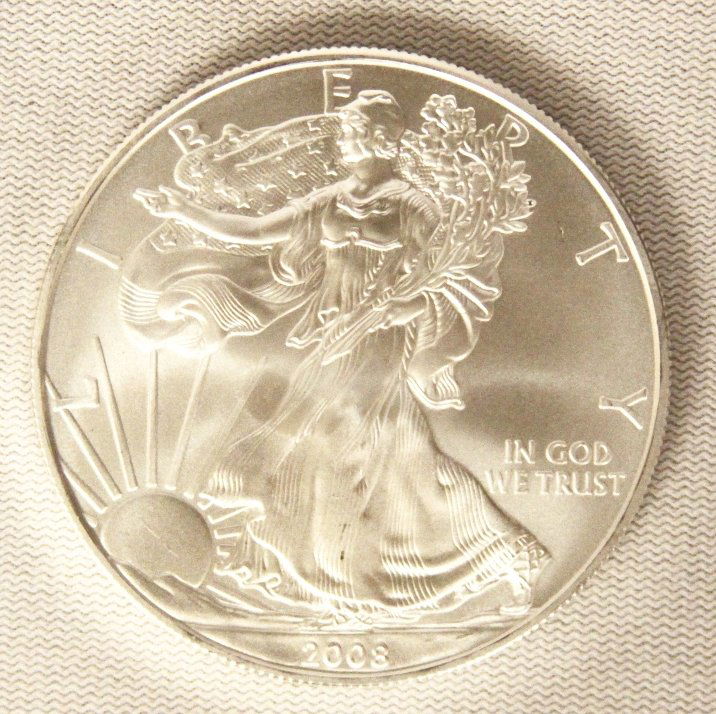 2008 American Silver Eagle COMS148: 2008 American Silver Eagle COMS148. As-Is Condition! ER14HE. 2008 American Silver Eagle. 1 oz. fine silver. Thank you for viewing this lot. We are always adding new inventory and new auctions, so chec
