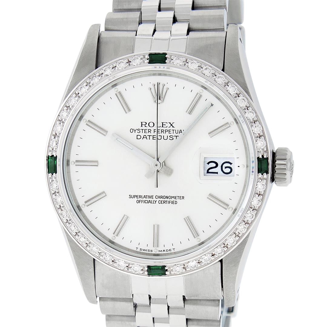 Rolex Mens Stainless Steel Silver Index Diamond And Emerald Bezel 36MM Datejust: One Mens Pre Owned Stainless Steel Rolex Datejust Polished Bright with Satin Finish, This Watch Has Been Serviced & Electronically Tested, Rolex Stainless Steel Case: 36mm, Rolex Stainless Steel Crown