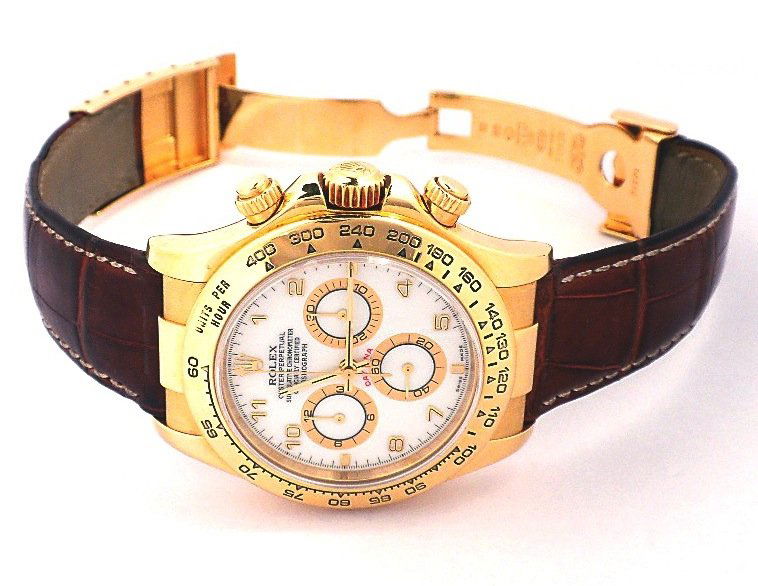 Gents Rolex 18KT Gold Daytona Wristwatch A3677: Gents Rolex 18KT Gold Daytona Wristwatch A3677. Great Condition! LE10711WH. One gents, hand crafted and machine milled Rolex 18KT yellow gold Daytona Cosmograph wristwatch electronically tested. Case: