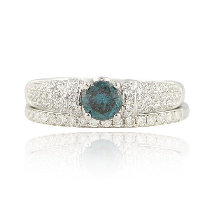 18KT White Gold 0.46ct Blue Diamond Wedding Ring Set FJ: 18KT White Gold 0.46ct Blue Diamond Wedding Ring Set FJM1929. Excellent Condition! RX127XS. One ring set containing: This is a 2 piece wedding ring set that contains 3.97 grams of 18KT White Gold, (1)