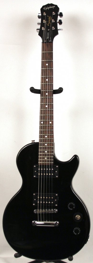 Epiphone Les Paul Special Solidbody Electric Guitar DGU: Epiphone Les Paul Special Solidbody Electric Guitar DGUI94. Great Condition! ZK201KJ. The Epiphone Les Paul Special Solidbody Electric Guitar sports a Mahogany Body and Neck, Rosewood Fingerboard, and