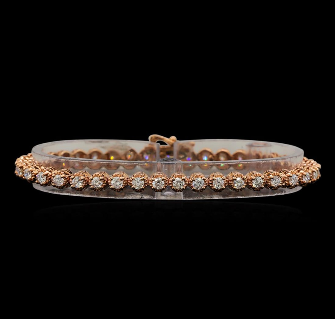 14KT Rose Gold 3.28 ctw Diamond Tennis Bracelet: One electronically tested 14KT rose gold ladies cast diamond tennis bracelet with a hidden box clasp with safety closer with a bright polish finish. Measurements: 7" in length Identified with markings