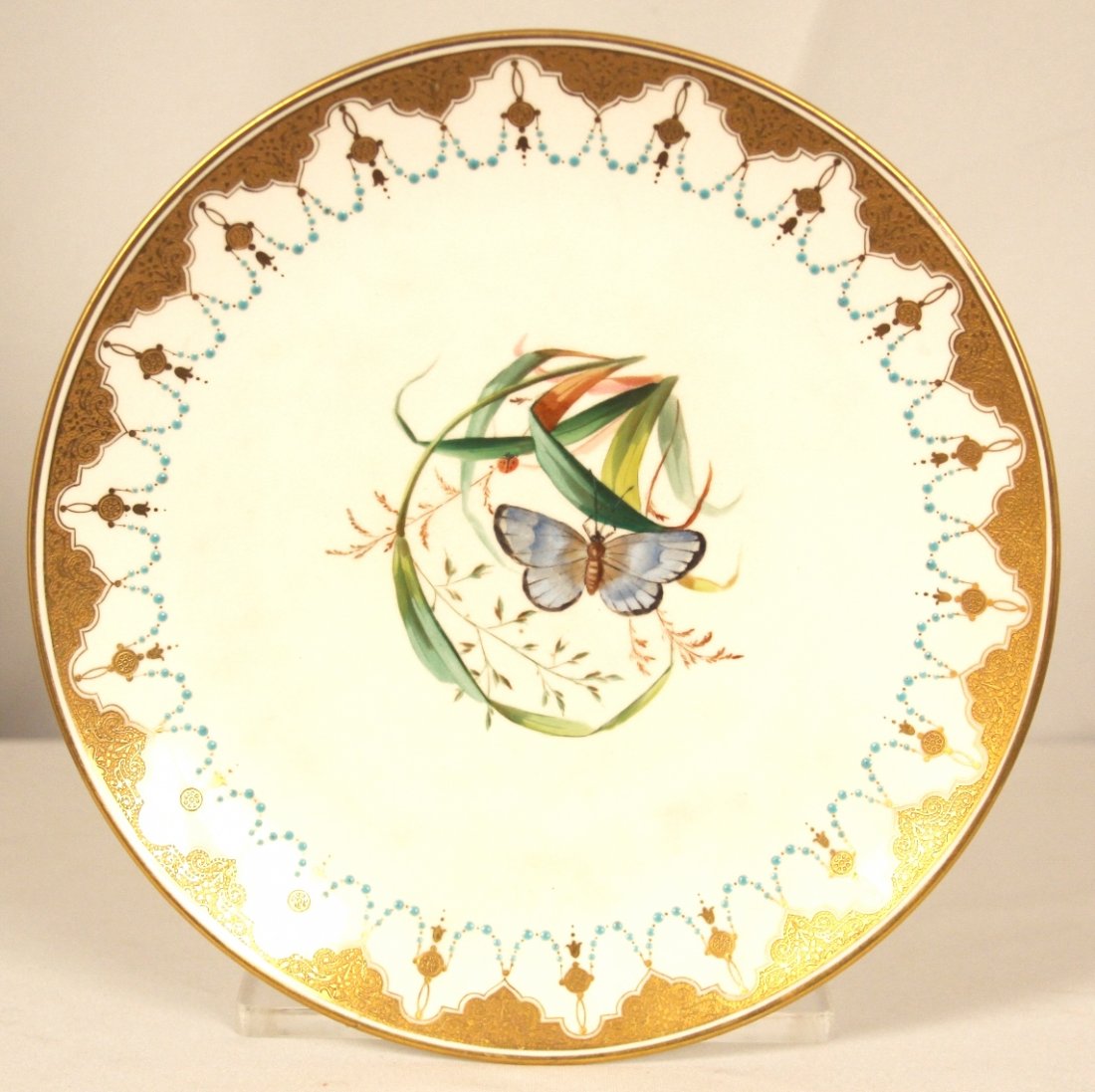 Antique Mintons Plate Blue Butterfly Hand Painted 1873-: Antique Mintons Plate Blue Butterfly Hand Painted 1873-1890 ED1242. Great Condition! PZ103NT. Antique Mintons Hand painted Plate - Marked with Minton Globe with crown indicating 1873-1890. Very ornate