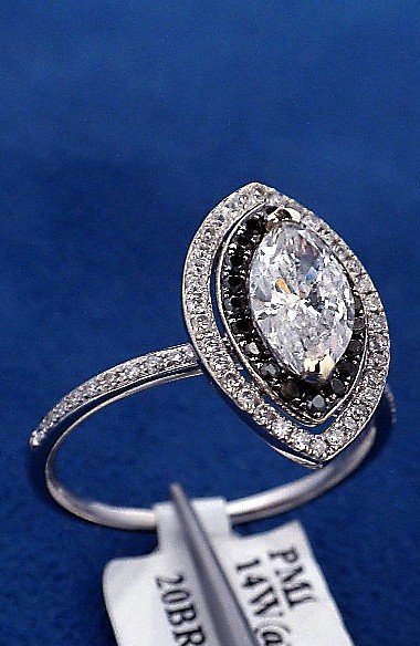 14KT White Gold 1.15ct Black and White Diamond Ring J12: 14KT White Gold 1.15ct Black and White Diamond Ring J12. New Condition! DC8221WI. One electronically tested 14KT white gold ladies cast and assembled black and white diamond ring. Good workmanship. Th