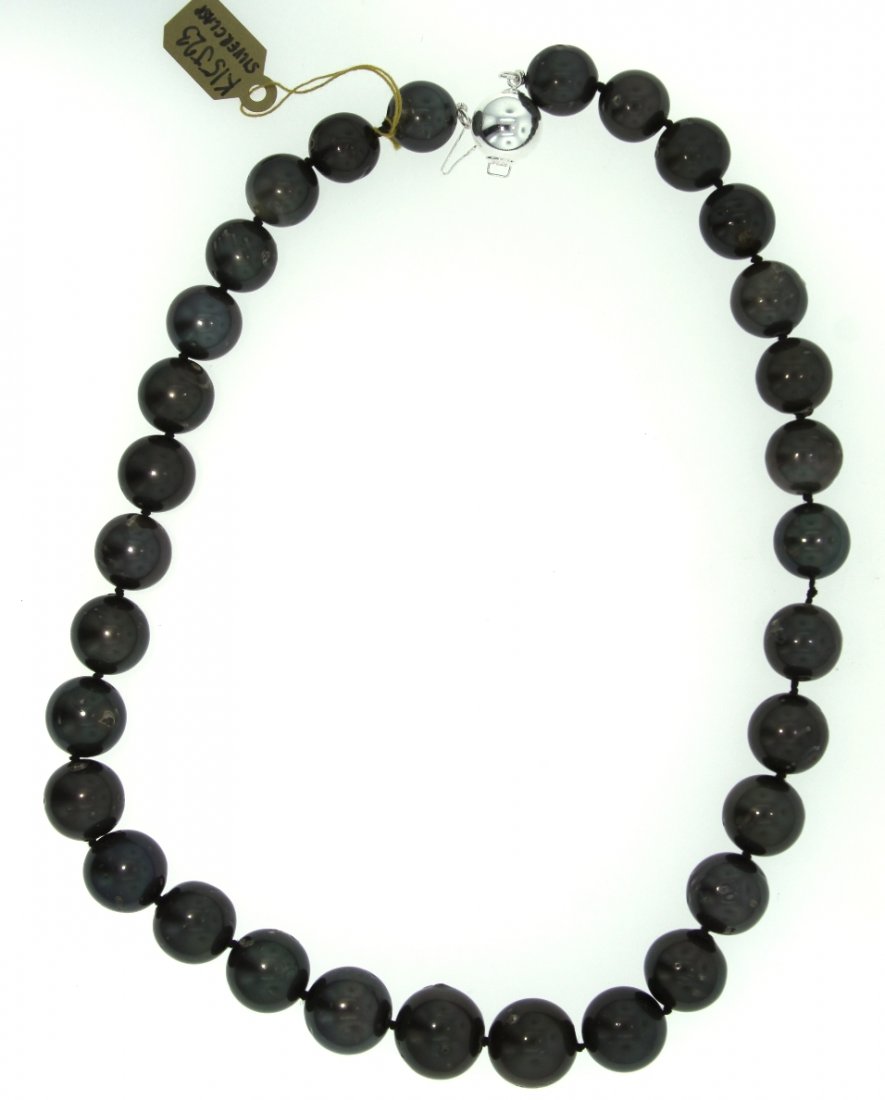South Sea Tahitian Pearl Necklace A3866: South Sea Tahitian Pearl Necklace A3866. New Condition! EK159XF. One ladies necklace, strand and knotted onto a silk thread containing 31 South Sea Tahitian Pearls, measuring 11.81mm- 14.95mm (range).