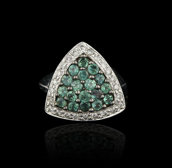 14KT White Gold EGL USA .90ct Alexandrite & Diamond Rin: 14KT White Gold EGL USA .90ct Alexandrite & Diamond Ring RM683. Excellent Condition! QB486EW. Laboratory Report: US 63239202C. WEIGHT: 0.90ct twt. Shape and CUT: ROUND MIXED. COLOR: Purplish green-gre