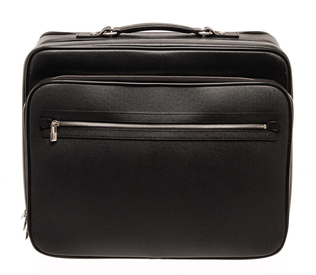 Louis Vuitton Black Taiga Leather Pilot bag: Louis Vuitton Black Taiga Leather Pilot bag. All available information is listed in the description and shown in the photos. Louis Vuitton Black Taiga Leather Pilot bag with exterior material: leather