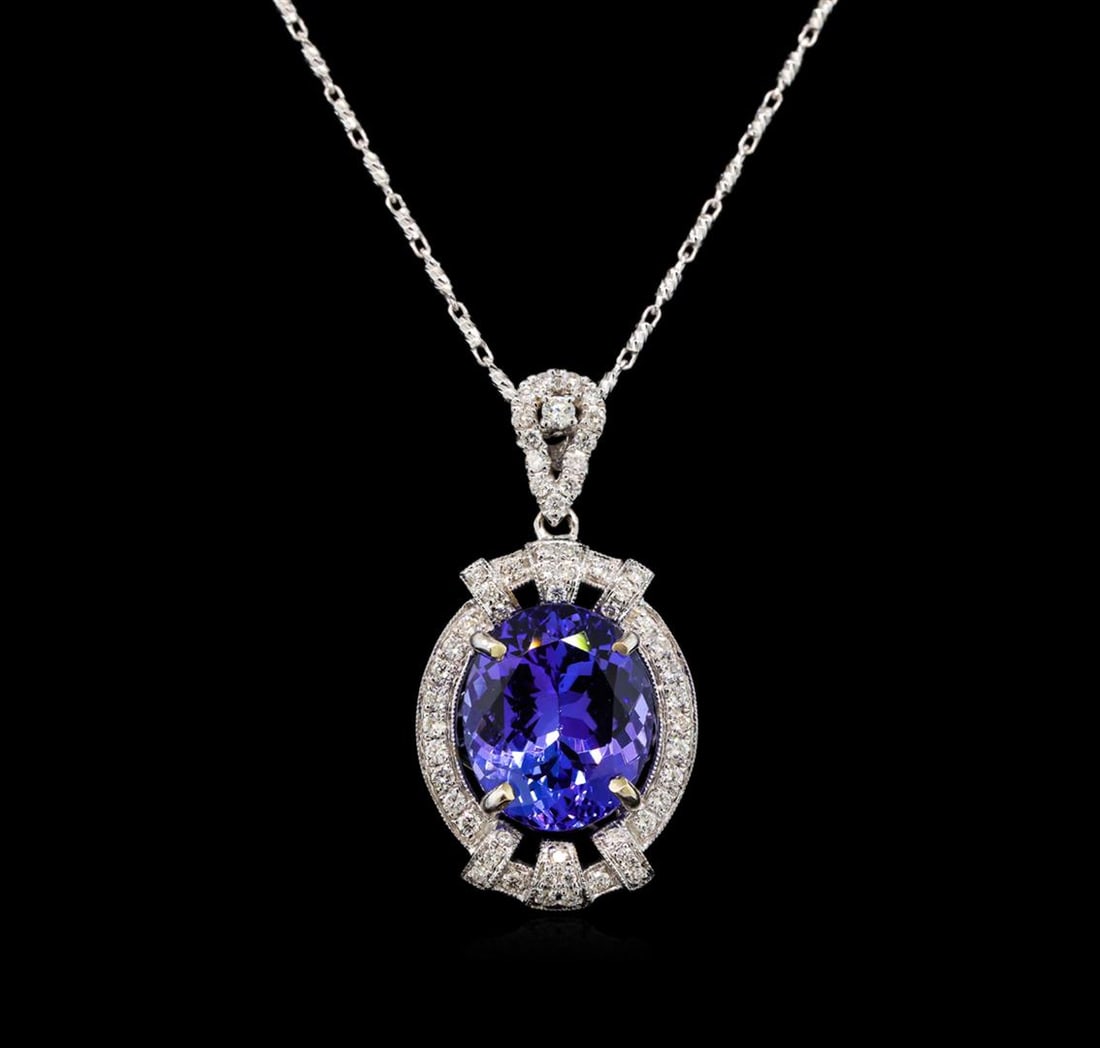 18KT White Gold 6.20 ctw Tanzanite and Diamond Pendant With Chain: One electronically tested 18KT white gold ladies cast tanzanite and diamond pendant & chain 16.0" long, with a lobster claw clasp with a bright polish finish. Identified with markings of "18K". Condit