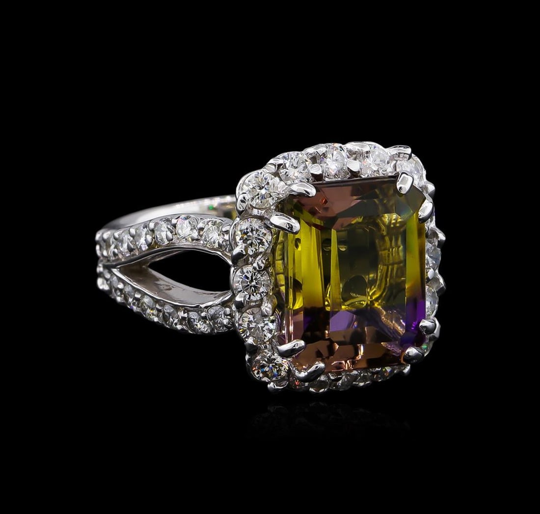 5.31 ctw Ametrine and Diamond Ring - 14KT White Gold: One electronically tested 14KT white gold lady's cast fashion ring with a split shank basket halo with a bright polish finish. The featured lady's ring has a double shank measuring 3.75 millimeters wi