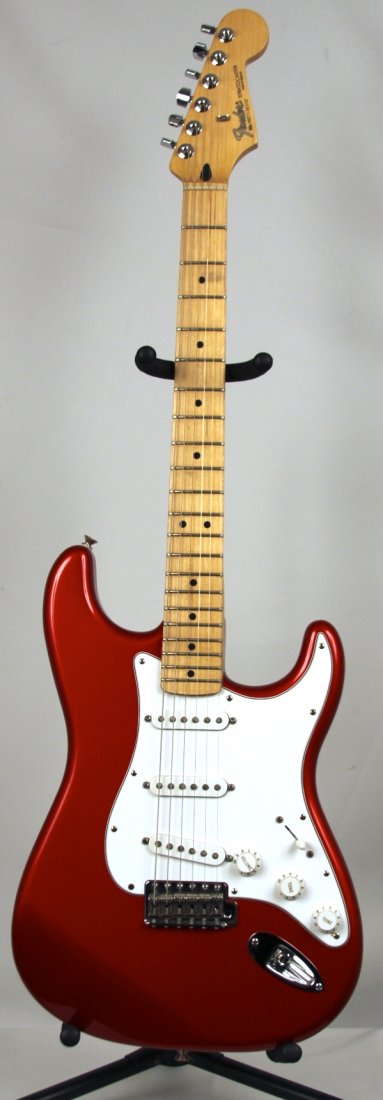 Fender Stratocaster in Red with Maple Fretboard DGUI33: Fender Stratocaster in Red with Maple Fretboard DGUI33. Great Condition! TQ503FP. First appearing on the market in 1954 and remaining in continuous production since, the Fender Stratocaster, or Strat"