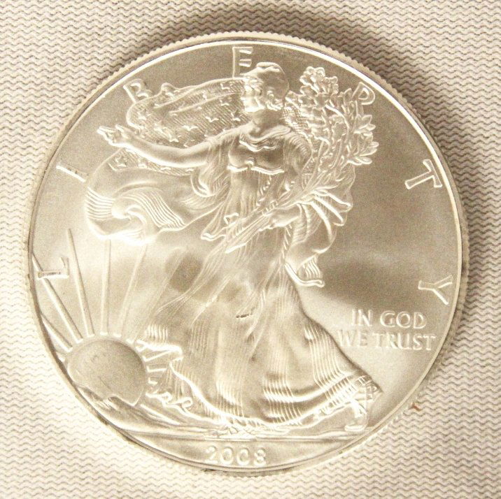 2008 American Silver Eagle COMS129: 2008 American Silver Eagle COMS129. As-Is Condition! BY14TH. 2008 American Silver Eagle. 1 oz. fine silver. Thank you for viewing this lot. We are always adding new inventory and new auctions, so chec