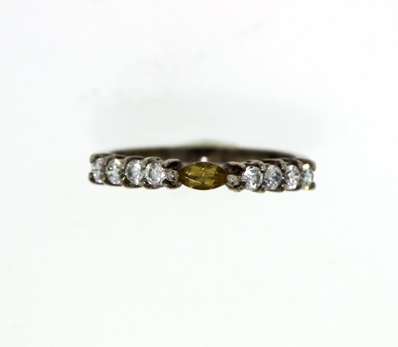 Sterling Silver Citrine and Diamond Ring GD136: Sterling Silver Citrine and Diamond Ring GD136. Good Condition! JG84OT. One sterling silver citrine and diamond ring. Identified with markings of 925". Total weight of diamonds: 0.75ct. Total weight o