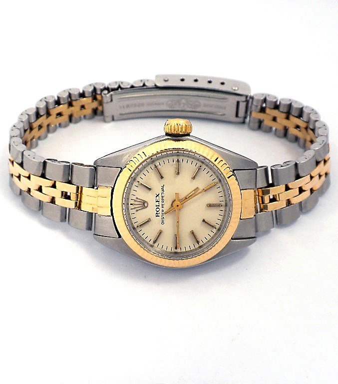 Ladies Rolex Two Tone Oyster Perpetual Wristwatch A3684: Ladies Rolex Two Tone Oyster Perpetual Wristwatch A3684. As-Is Condition. KH1031RT. One ladies, hand crafted & machine milled Rolex Oyster Perpetual Model stainless steel & 14KT yellow gold wristwatch