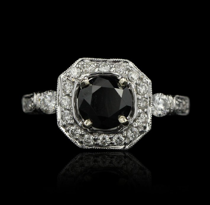 14KT White Gold 2.20ctw Black and White Diamond Ring RM: 14KT White Gold 2.20ctw Black and White Diamond Ring RM723. Excellent Condition! CD968YB. One lady’s polished, stamped and electrically tested solid 14K white gold ring mounted with: 1 Genuine round