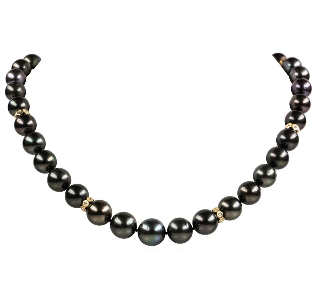 Pearl and Diamond Necklace: One graduated single strand pearl necklace 19.5' princess length, knotted with a tongue clasp & foldover safety containing 35 Tahitian pearls, 14.4mm to 11.0mm in size. The pearls are black in color, 