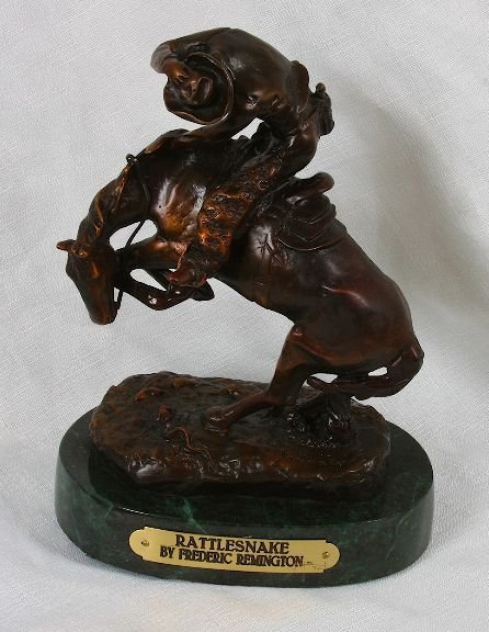 Frederic Remington Bronze Statue Reproduction - Rattles: Frederic Remington Bronze Statue Reproduction - Rattlesnake - As-Is Condition JK57RT - Thank you for viewing this lot. We are always adding new inventory and new auctions, so check back often. We appr