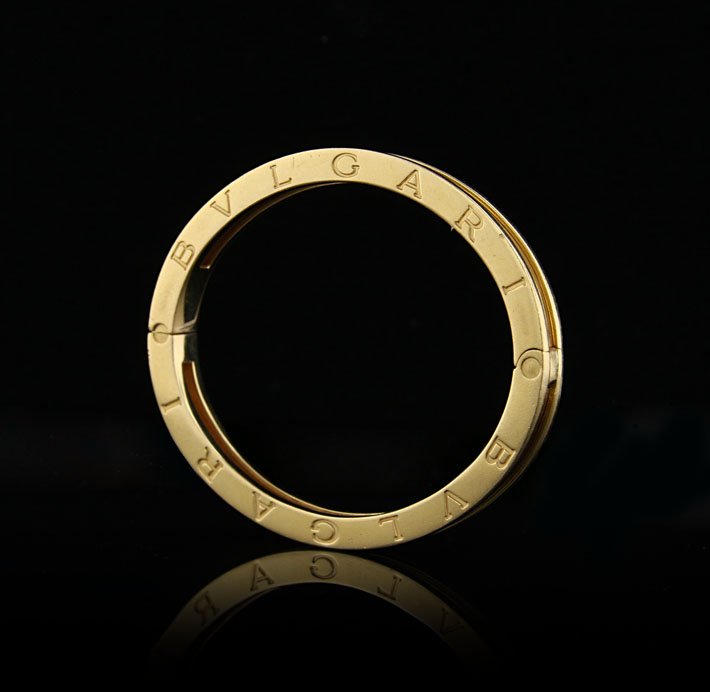 18KT Yellow Gold Bulgari B.ZERO1 Bangle A4023: 18KT Yellow Gold Bulgari B.ZERO1 Bangle A4023. Good Condition! RM1052RP. One electronically tested 18KT yellow gold ladies cast & assembled B.ZERO1 bangle bracelet with a bright polish finish. Conditi