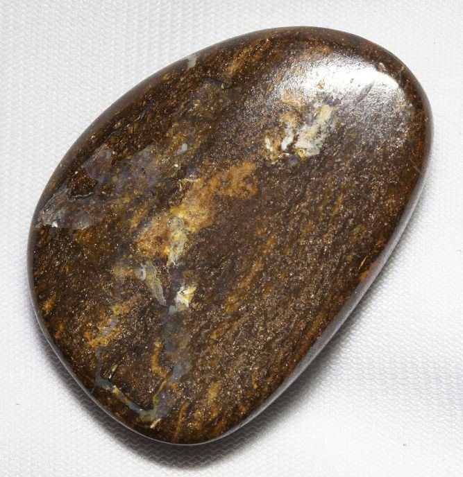 Boulder Opal (143.21ct.) BO97: Boulder Opal (143.21ct.) BO97. Excellent Condition! SM4QV. One Boulder Opal weighing 143.21ctw. Thank you for viewing this lot. We are always adding new inventory and new auctions, so check back often